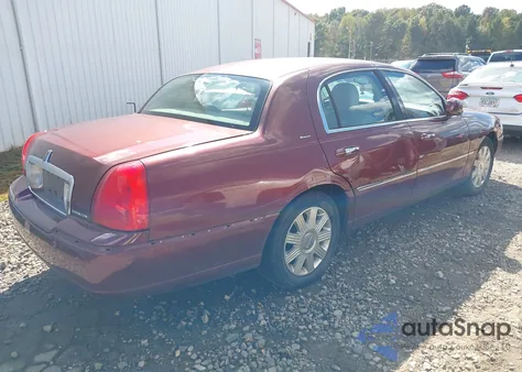 2004 Lincoln Town Car Ultimate из США, поврежденный, VIN 1LNHM83W74Y682920